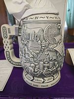 Left profile showing Middle Ages relief, timeline years, handle text