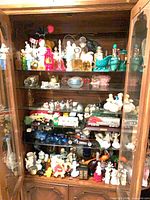 Full cabinet view showing entire mixed lot