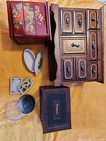 all six boxes and dish arranged on surface