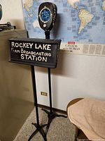 Full view of floor-standing sign with sign box, twin poles and base