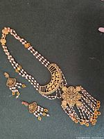 Necklace and earrings full view