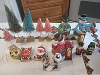 Group shot of all 16 holiday items arranged on table