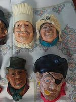 Group showing chef, Victorian lady, top-hat gentleman, pirate