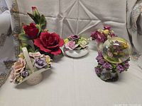 Group shot showing all five floral decorative pieces