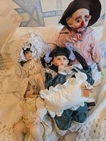 Group shot of four dolls on white background
