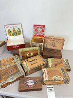 Group shot of all cigar boxes showing quantity, brands and condition