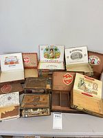 Group shot of all 13 vintage cigar boxes showing variety of brands and sizes