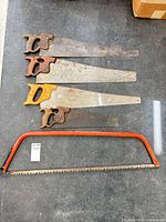 Five saws laid out for overall view