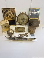 Group shot showing all brass desk pieces