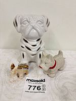 overall view of ceramic bulldog scent holder, Scottie figurine and stone donkey