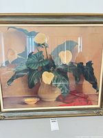 Full view of framed calla lilies print in gold-tone frame