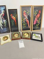 Group shot of all eight framed artworks