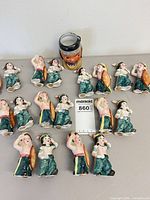 Group of nine salt & pepper shaker pairs and head vase