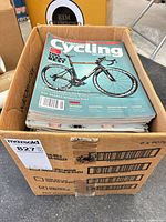 Box filled with stacked Canadian Cycling Magazine issues