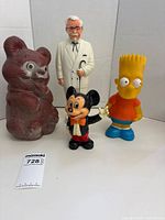 Front view of all four character coin banks