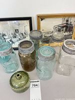 Group of jars, pottery filler, framed photos