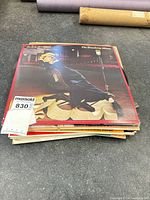 Stack of records, top cover Barbra Streisand The Broadway Album, showing stack thickness