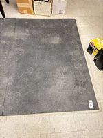 Full view of rubber gym mat laid flat on floor