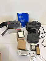 Group shot showing all cameras, manual, boxed accessories