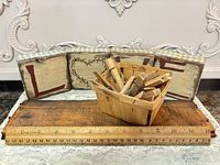 Overall set: LOVE blocks, basket with clothespins on wood plank