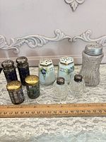 Group shot of all nine shakers lined up for identification