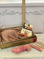 Overview of box with stockings, Tre-Chic card, hair forks and wrapped hairpins
