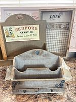 Group shot showing letter sorter, Bedford sign and hook board