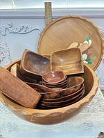 Entire set showing large bowl, small bowls, servers, painted tray