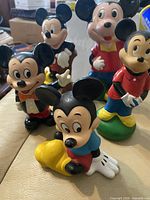 Five Mickey Mouse banks grouped