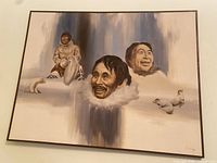 Framed oil painting showing Inuit figures and seals