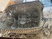 Basket containing assorted crystal stemware
