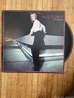 Front view of Nick Gilder “City Nights” LP jacket with vinyl partially visible