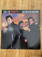 Front cover of Omar & The Howlers Hard Times In The Land Of Plenty vinyl LP