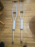 Full view of both crutches showing overall condition