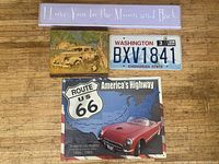 All four wall hangings laid out on wooden surface