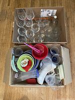 Overview of both boxes showing glassware and kitchen items