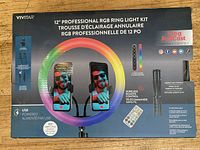 Front of sealed box showing Vivitar 12" Professional RGB Ring Light Kit and included accessories