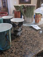 Group view showing pitcher, three tumblers and salt & pepper shakers