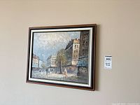 Full view of framed painting on wall