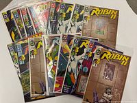 All 17 bagged comics displayed in fan layout showing multiple cover artworks