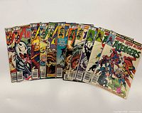 All ten comics fanned out showing covers and issue numbers