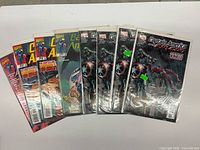 Nine Captain America issues fanned out