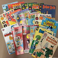 Front view showing all 14 comics fanned out