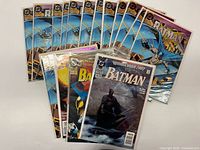 Group shot displaying twelve copies of Batman #500 and three additional distinct Batman issues
