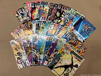 All comics fanned out showing variety of covers from the three series