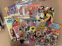 Entire lot laid out showing front covers of all comics