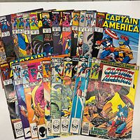 Spread of 20+ Captain America comics varying issues and cover prices