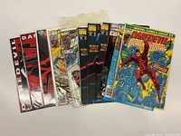 All comics fanned out, showing spines and covers