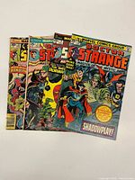 Four Doctor Strange comics fanned, full lot visible