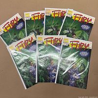 Seven sealed Fury #1 comics fanned out showing cover art and intact polybags
